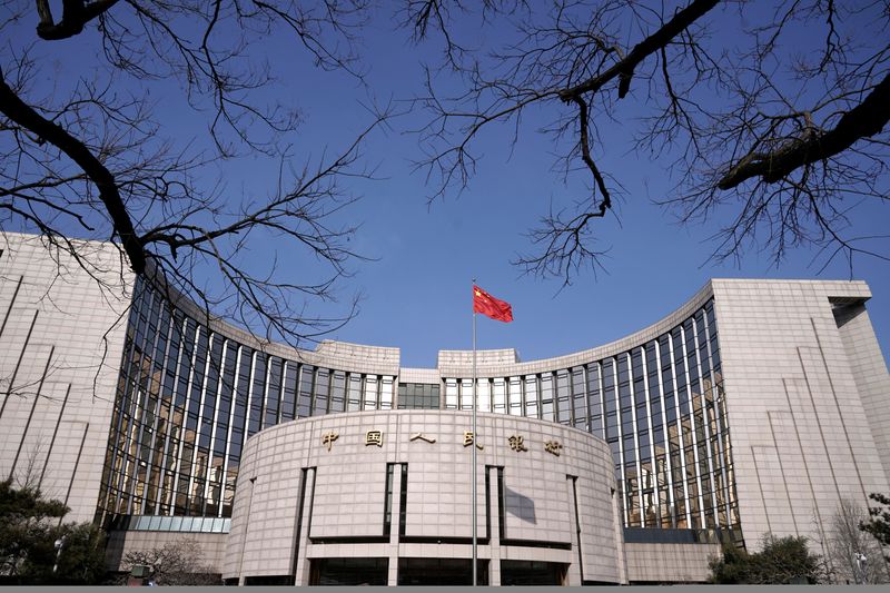 China cuts benchmark lending rate to prop up virus-hit economy