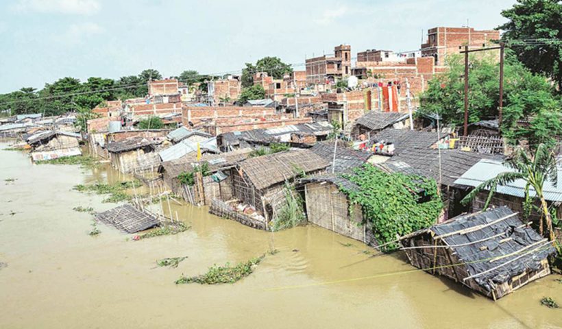 Floods, coronavirus hobble two of India's poorest states